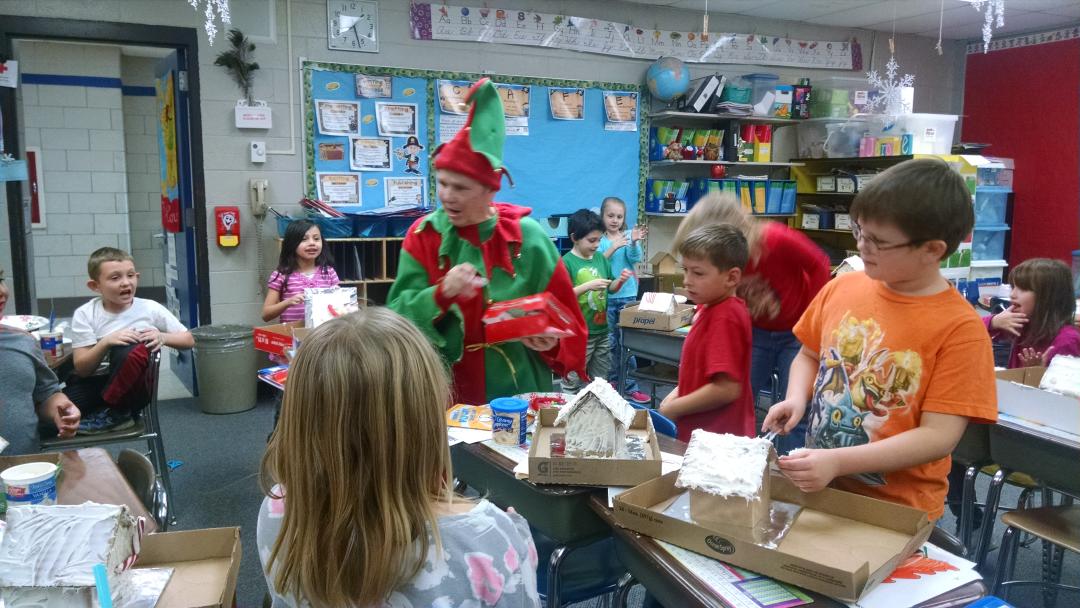 Fulton_Elem's tweet photo. Our 2nd grade students had a special visitor while making gingerbread houses.  Thanks to our special visitor! http://t.co/eQoxIyPLH6