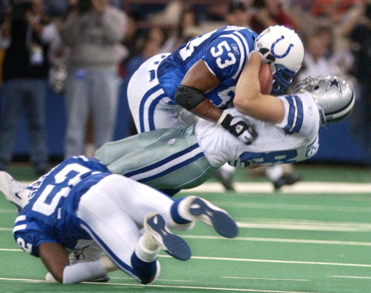 zkeefer's tweet photo. Throwback to last time #Colts beat Cowboys (11/17/02). Marcus Washington + Mike Peterson smash Dallas TE James Whalen http://t.co/DR2BiAR04x