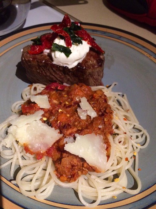 #AtHome #homemade Filet Mignon topped W/ goat cheese sun dried tomato & basil w/ spicy red pepper spaghetti