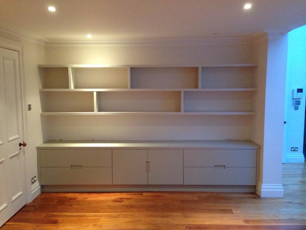 FBCarpentry's tweet image. Shelving and cupboard. Nice integrated handle detail on the doors.