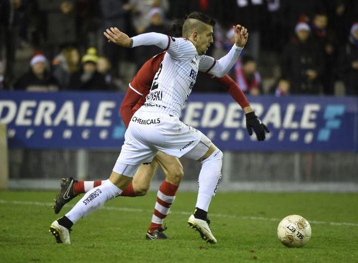 Trajkovski dribbles the ball
