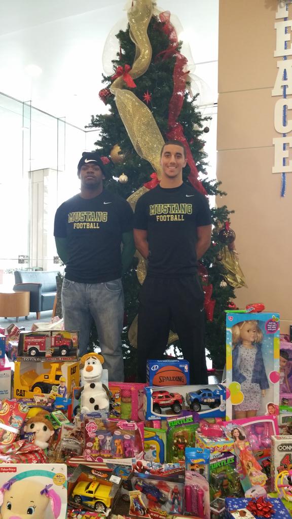 SouthOptimists's tweet photo. South Optimist football team playing Santa at Shriners Children's Hospital this morning.  #Givingback http://t.co/AjVjrO606f