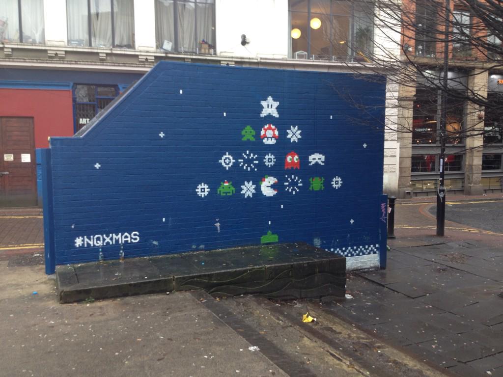 JackGYarwood's tweet photo. There's some awesome retro gaming + Christmas street art in #Manchester at the moment #NQXMAS http://t.co/iptweT5ICF