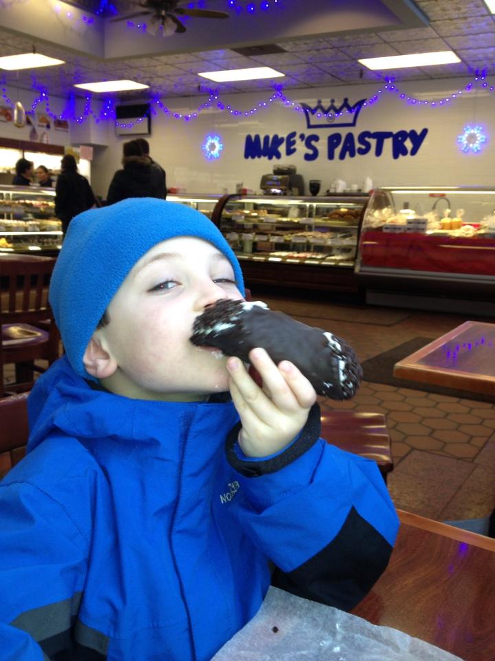 fahy_michael's tweet photo. With the little guy at Mike's in the North End of Boston. #breakfastofchampions http://t.co/GdB121QtBx