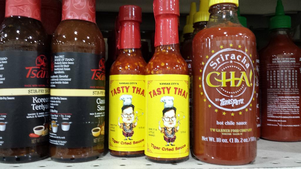 TheMarcus's tweet photo. Look what I found at @henhousemarket. Let the Tiger cry! @TigerCriedSauce @1MillionCupsKC #1MC #showmetheheat http://t.co/RXO2COSKDN