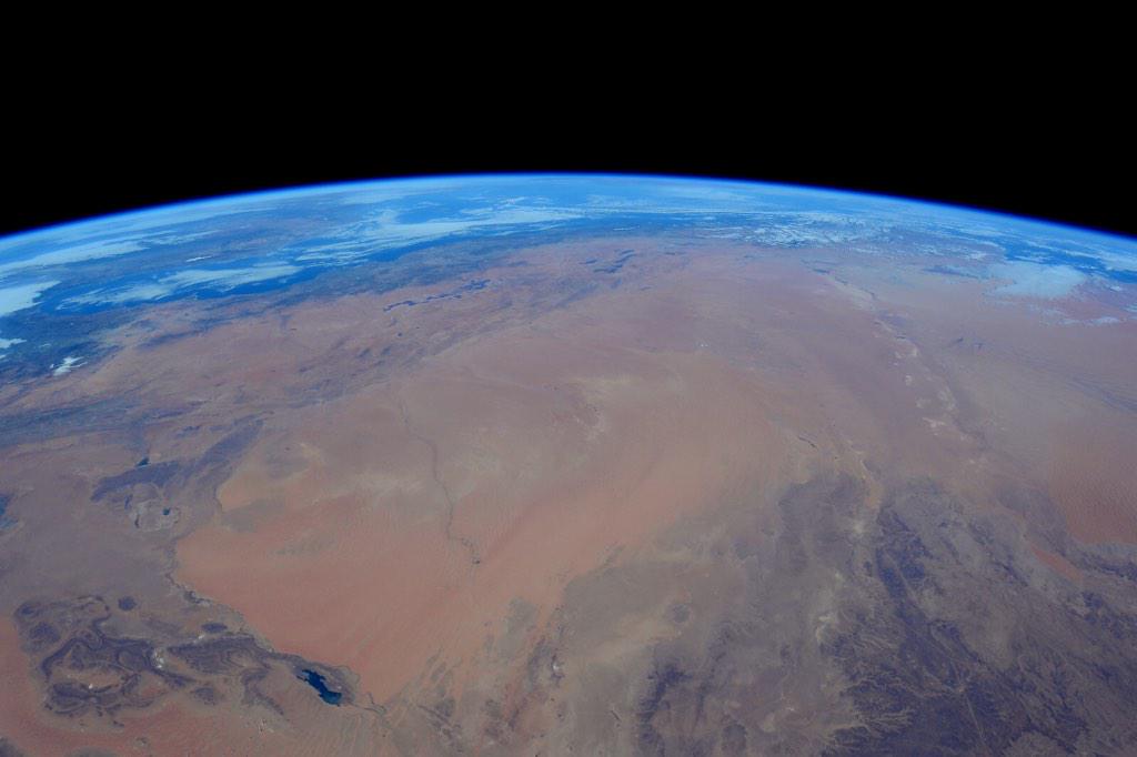 AstroTerry's tweet photo. The blue of our atmosphere and Mediterranean, contrasted to the rust colored #Sahara desert http://t.co/m9kyyicp2q