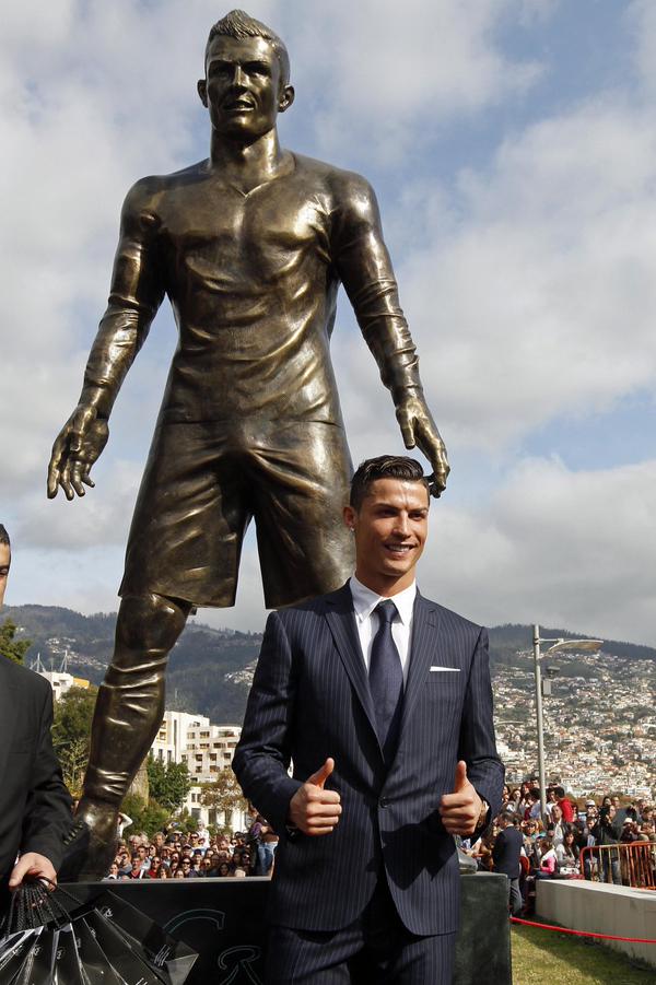 RadioX's tweet photo. Fair to assume #Ronaldo was 'excited' to have a statue of himself erected in his home town. @therichwalters. http://t.co/unxrbq9NP5