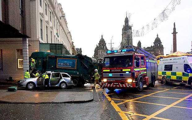 Telegraph's tweet photo. Six people feared dead after bin lorry crashes into pedestrians in Glasgow. Latest: http://t.co/MNrL4K170G (SWNS) http://t.co/rl1kG5nwHc