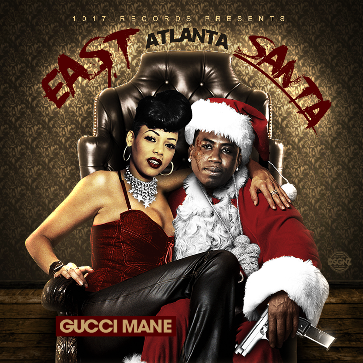 Keyshia Ka'oir sits on @gucci1017'slLap on 'East Atlanta Santa