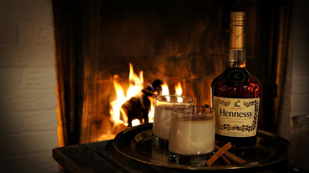Hennessy's tweet image. Forget the chestnuts. Enjoy the #Hennessy Eggnog in front of an open fire.
