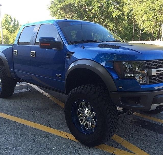 Army green color Special Vehicle Team SVT Ford F-150 off-road Raptor ...