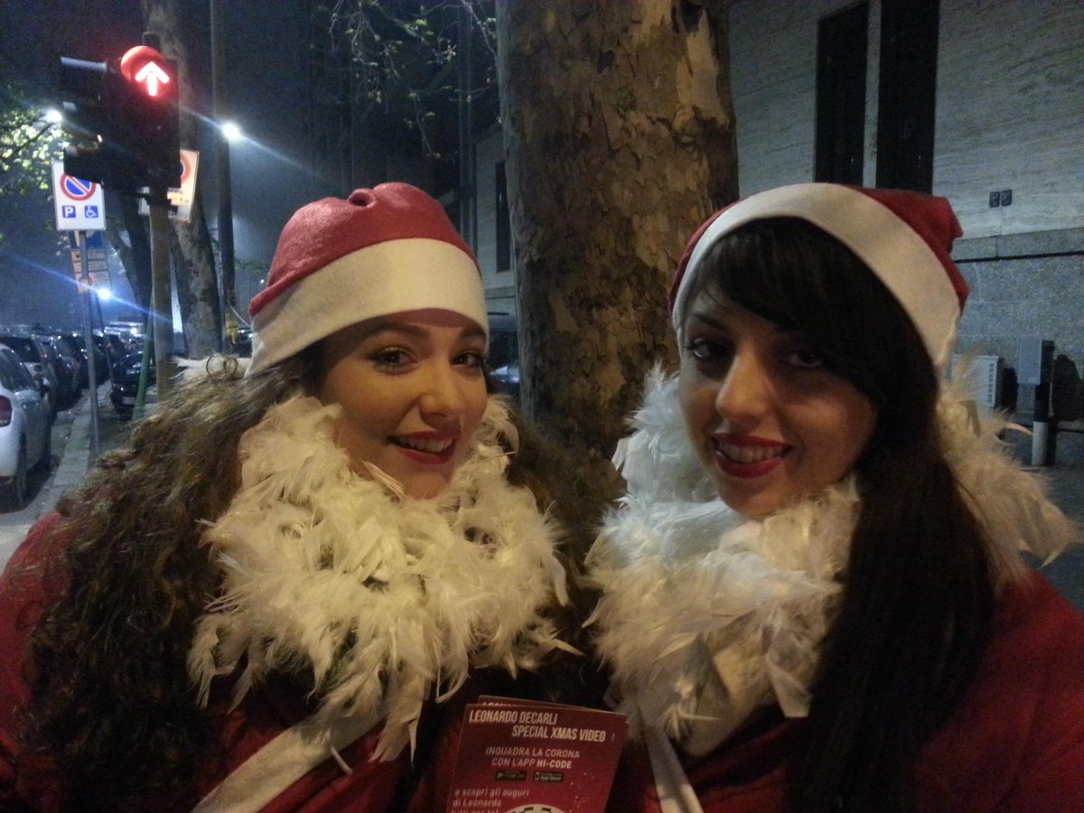 Hi_Code's tweet photo. Hi-code Christmas girls in giro per Milano con i flyer del video esclusivo di Leonardo Decarli #dilloconhicode http://t.co/u0MPHgESL1
