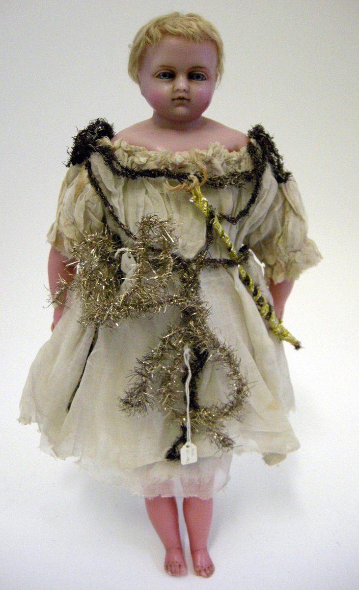 young_vam's tweet photo. What's on the top of your Christmas tree? This Christmas doll from our collections dates from 1900-1925 #CuratingXmas http://t.co/qkJa8h0HOp