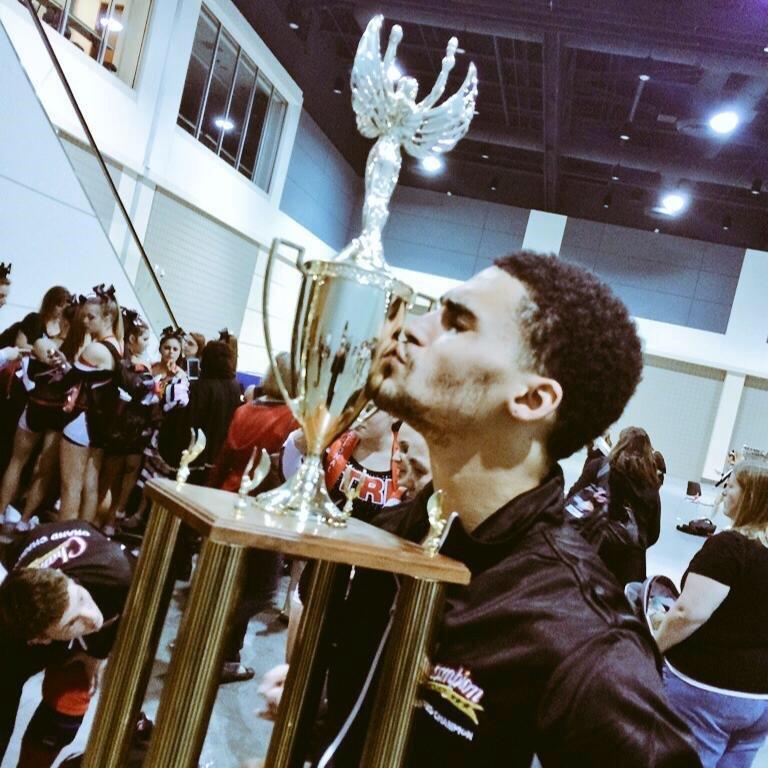 Champion_Cheer's tweet photo. A Grand Champ from Tri-Athletics at "Holiday Cheers to You"! Who needs mistletoe when you win "The Champion Cup"?! http://t.co/hzm3sbhNtS