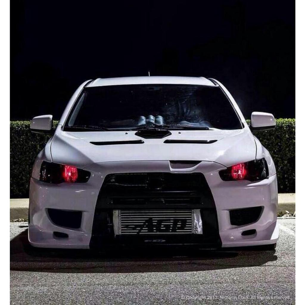 ModifyingCars's tweet image. White Evo