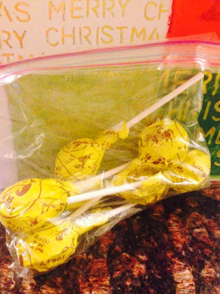Monlovescatz's tweet photo. Elizabeth Teklits is a monster and got me banana tootsie roll pops for Christmas. http://t.co/PPjzD0w0CK