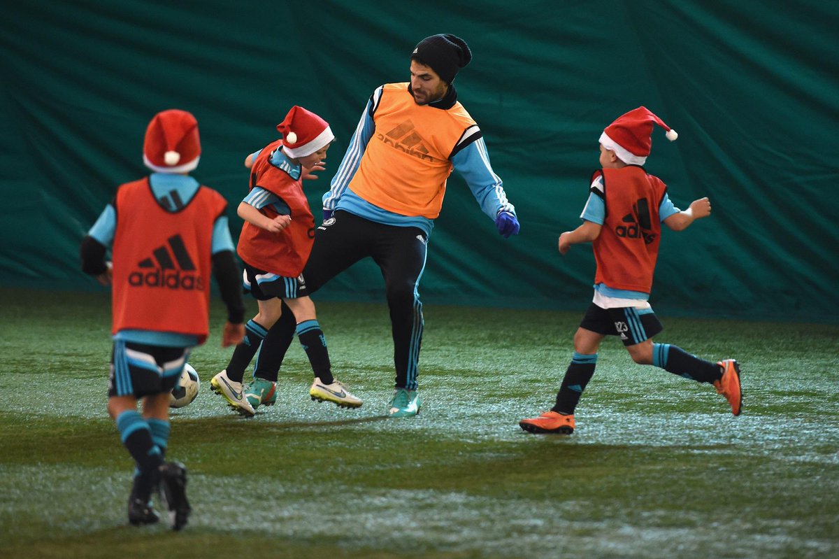 ChelseaFC's tweet photo. .@cesc4official also in the thick of things against the Chelsea Under-8s... #CFC http://t.co/gvyACasEl0
