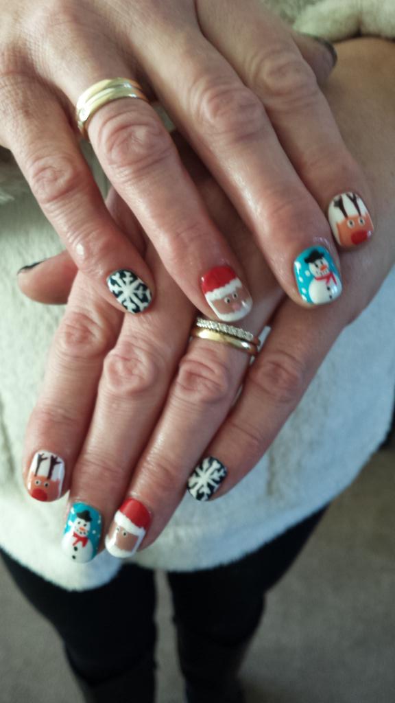 Christmas nails by Brogan's Beauty in Seahouses. Now the Mrs won't touch anything, in case she damages them!
