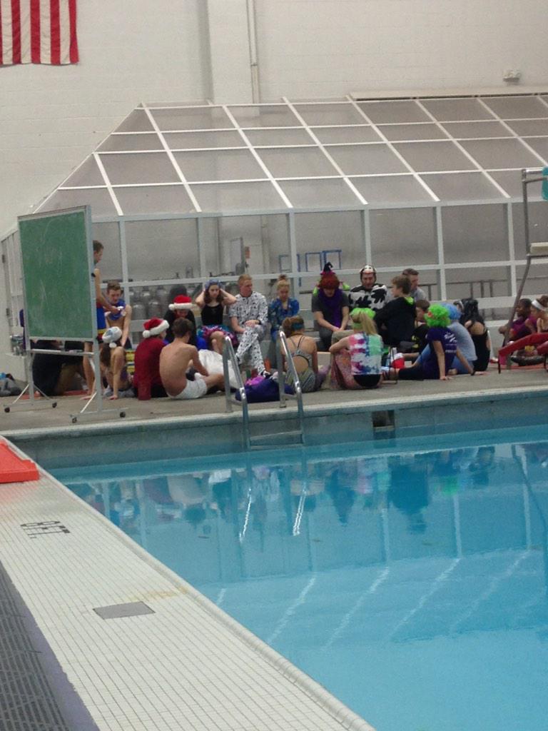 Team Secret Santa this morning! Lots of 70s hair and onesie pajamas....