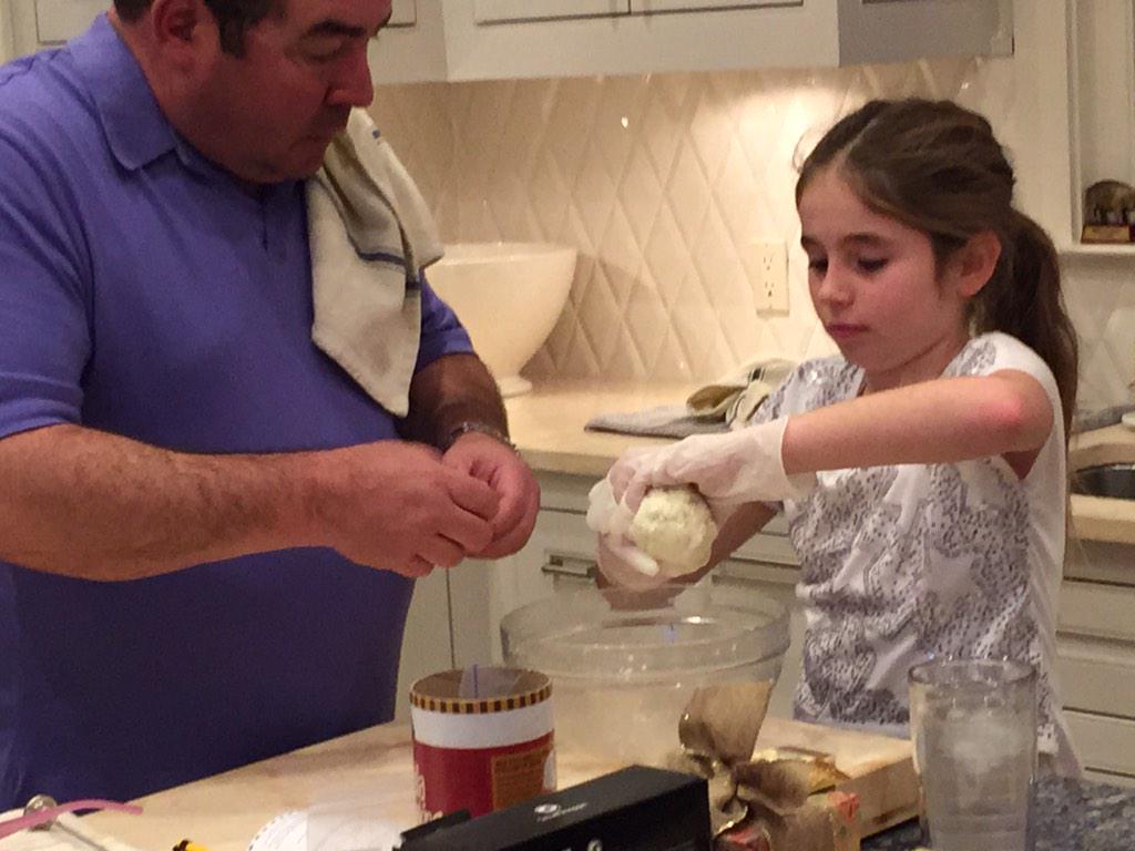 Emeril's tweet photo. Making mozzarella with my daughter, Meril. #Christmas #cheese http://t.co/cTVLHXJLdc