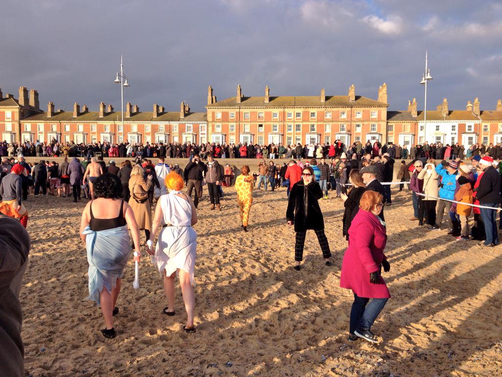 somerogers's tweet photo. Hundreds of lovely, mad people taking part in Christmas Day swim, Lowestoft. http://t.co/ePzGDtXYzB