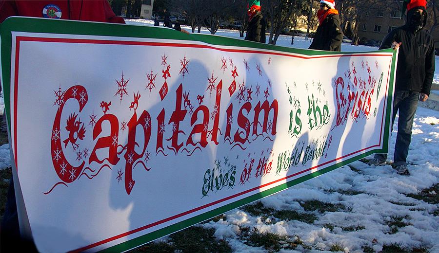 madamecp's tweet photo. "Capitalism is the crisis! Elves of the world revolt!" (From the DABC Elves Revolt, 12/17/2011.) #COProtests http://t.co/Mtph5yVcMA