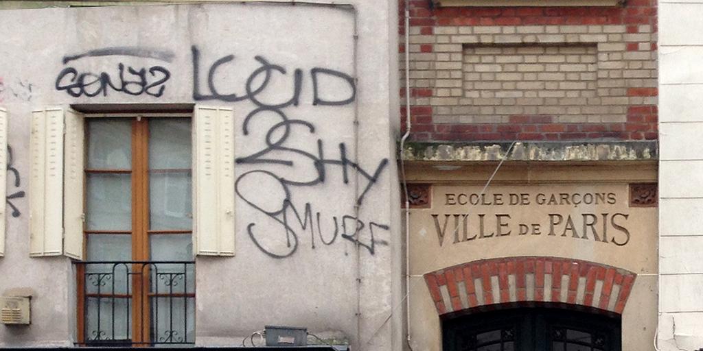 ParisOneForty's tweet image. To the left of a sign for a school for boys lies the irrefutable evidence of the fact that, well — boys will be boys.