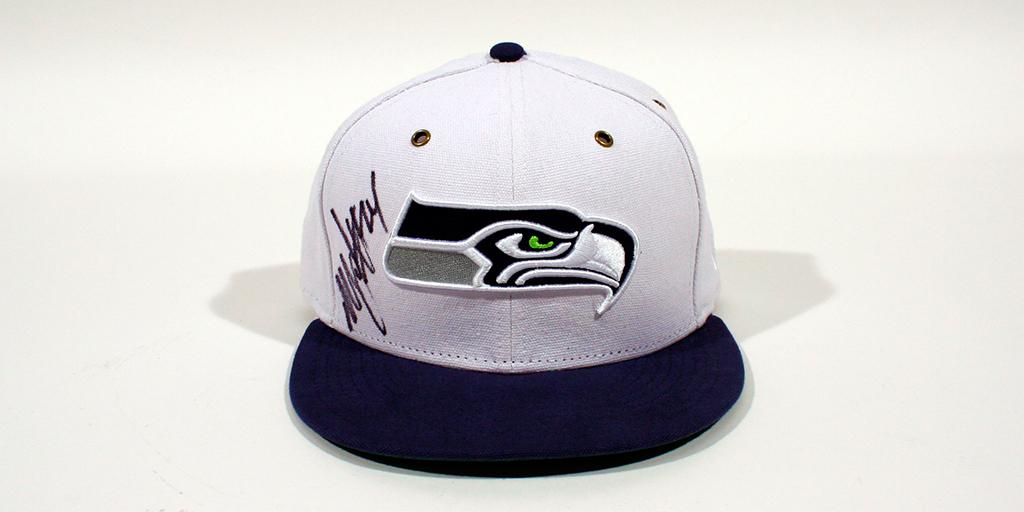 SeahawksProShop's tweet photo. RT and Follow to win a signed @MoneyLynch cap! We will pick a winner once we hit 25K followers. 

Happy #TGIBF http://t.co/TTE9QkYrHI