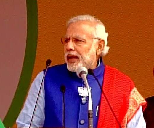 TimesNow's tweet photo. PM Modi kicks off the poll campaign in Delhi as he takes the stage at Ramlila Maidan #BattlegroundDelhi http://t.co/0uzSneQbsD