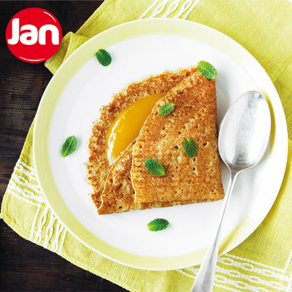 Zin in iets lekkers? Probeer eens JAN z'n Pannenkoeken met warme lemon curd. Extra lekker met wat muntblaadjes!
