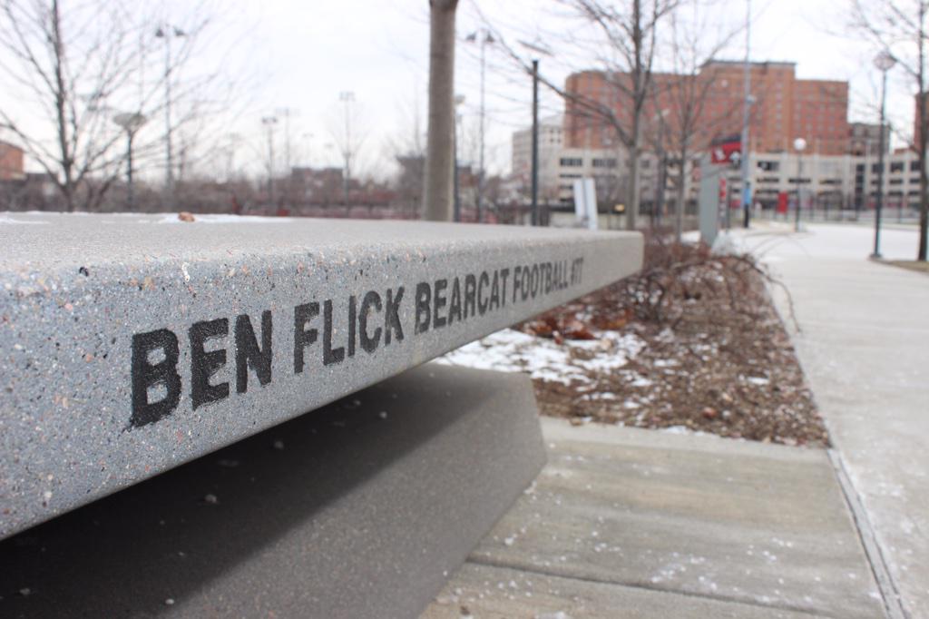 GoBearcatsFB's tweet photo. The bench commemorating former #Bearcats OL Ben Flick has been finished and overlooks Nippert Stadium http://t.co/FBcXJ7ezcE