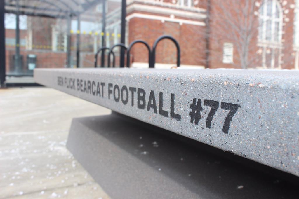 GoBearcatsFB's tweet photo. The bench commemorating former #Bearcats OL Ben Flick has been finished and overlooks Nippert Stadium http://t.co/FBcXJ7ezcE