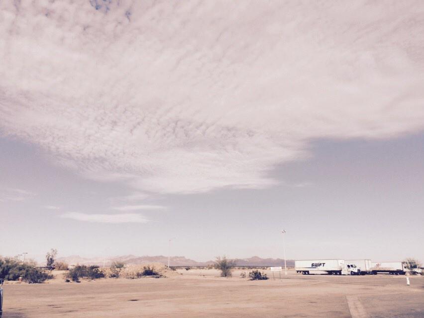CraigyFerg's tweet photo. Road Trip! Big sky at truck stop in 'Murica. Must resist having jerky. And also dried meat. #jokeformula. http://t.co/io4MQAh9sF
