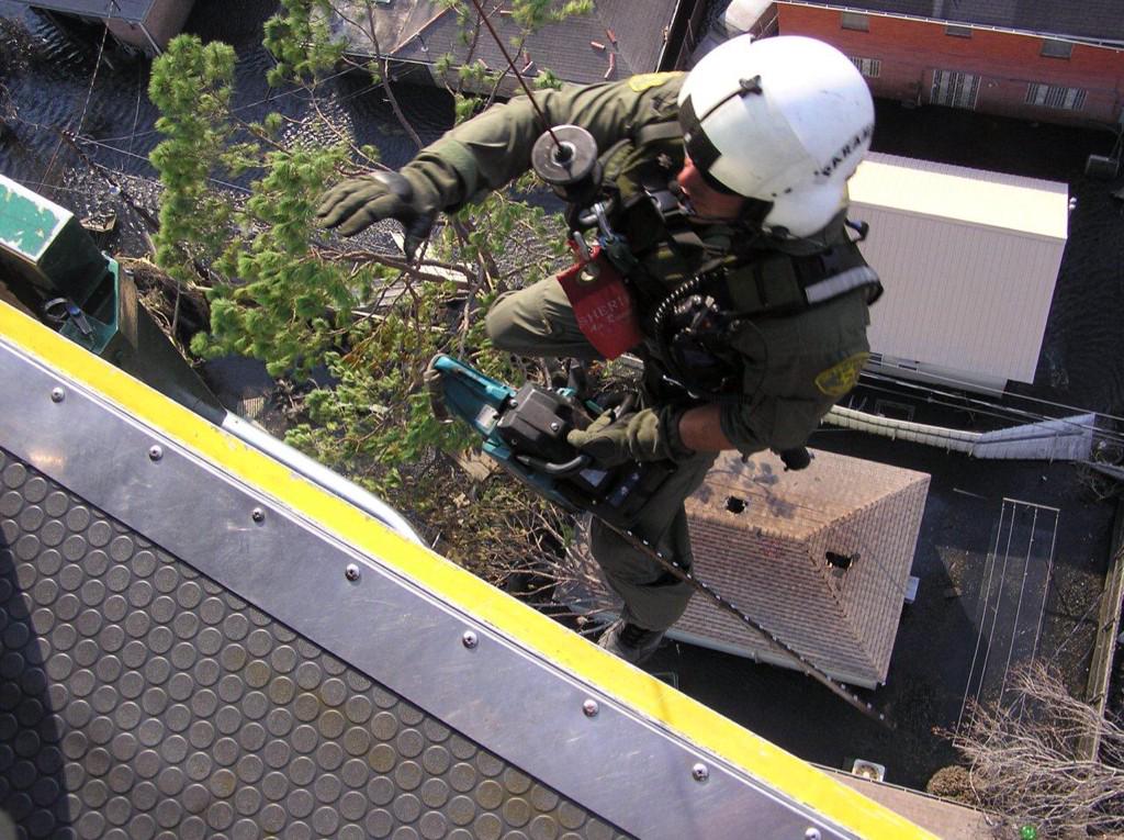 SEBLASD's tweet photo. #TBT - 2005 - #LASD Air 5 w/SEB Tactical Medics fly rescue missions in New Orleans after Hurricane Katrina. @LASDHQ http://t.co/kgAEH1VCBH
