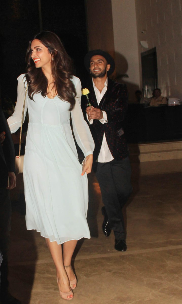 ieEntertainment's tweet photo. Pics - When @RanveerOfficial followed rumoured ladylove @deepikapadukone with a flower in hand http://t.co/AwpDQMFnTc http://t.co/Mf3M2MCNXX