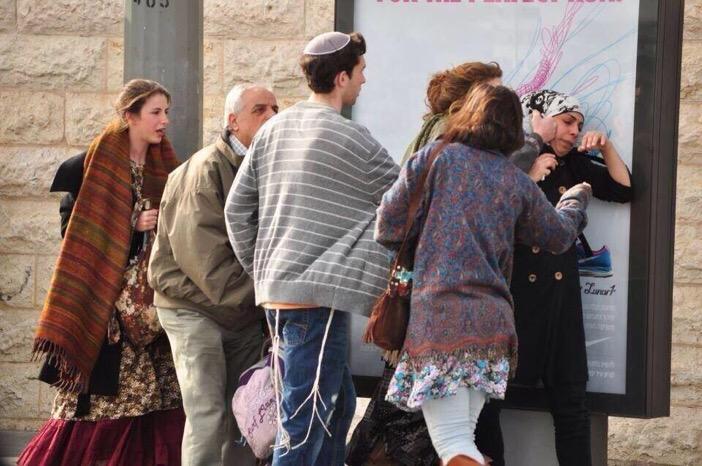 iMinaMaher's tweet photo. Israelis attacking a Muslim women, trying to take her hijab off. Why isn't this on the news? 
Lee haa lee !!! http://t.co/CvpDDSgEE7