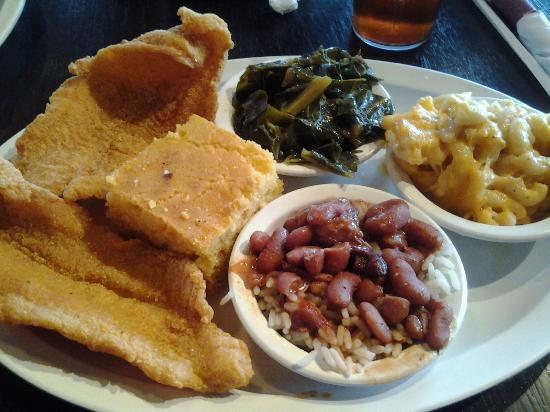 Fried fish, red beans and rice, mac &amp; cheese, and collard greens.