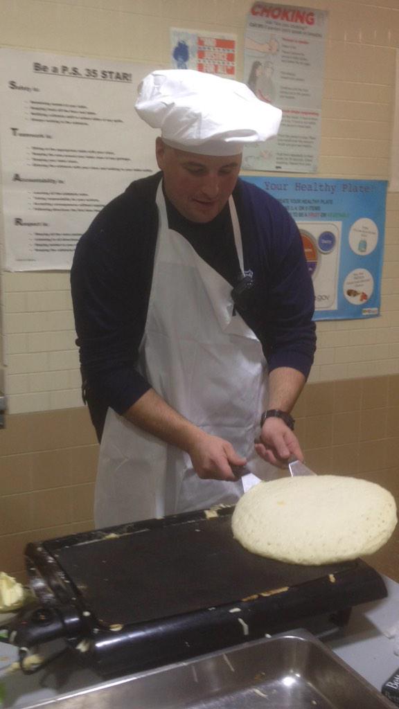 NYPD103Pct's tweet photo. And the winner... PO Andrew-Sales makes the bigger pancake! And eats it! Better luck next time Sgt. Strom. #103pct http://t.co/nZmGLJmS26