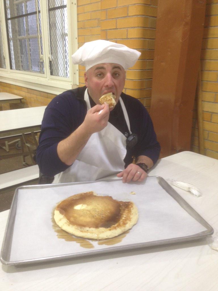NYPD103Pct's tweet photo. And the winner... PO Andrew-Sales makes the bigger pancake! And eats it! Better luck next time Sgt. Strom. #103pct http://t.co/nZmGLJmS26