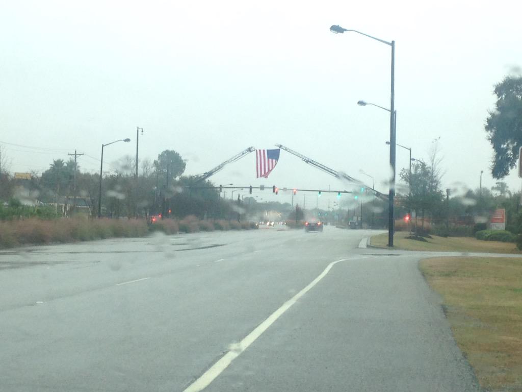 MountPleasantPD's tweet photo. Our @MountPleasantFD has the flag over Hwy 17 at MaGrath for former Gov. Edwards. #mtpsc #chstrfc ^cg http://t.co/I3bf2vfxqK