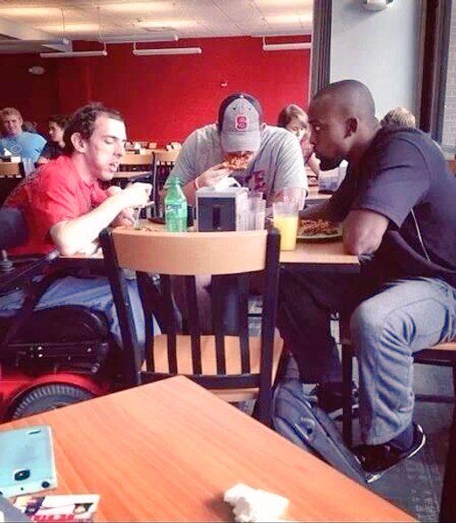 SneakerheadAkh's tweet photo. Two NC state football players sat with a student who was eating alone at lunch. http://t.co/UMMbKKYQV4