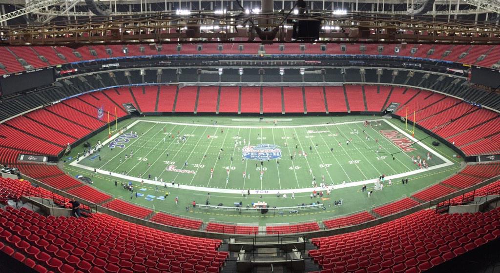 OleMissPix's tweet photo. .@OleMissFB is on the field at the Georgia Dome! #CFAPeachBowl http://t.co/1FMOuWPJTP