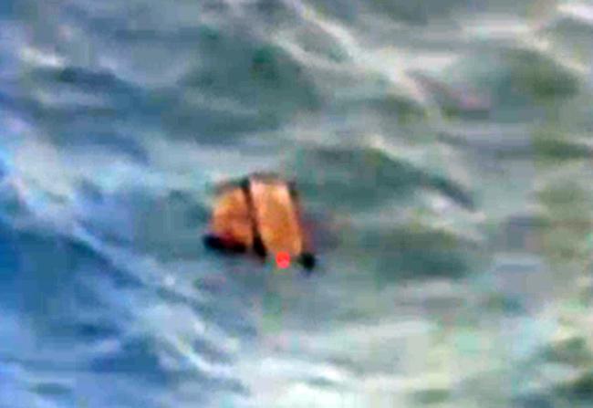 Indonesian officials say 'victims' spotted near site where AirAsia plane disappeared 
