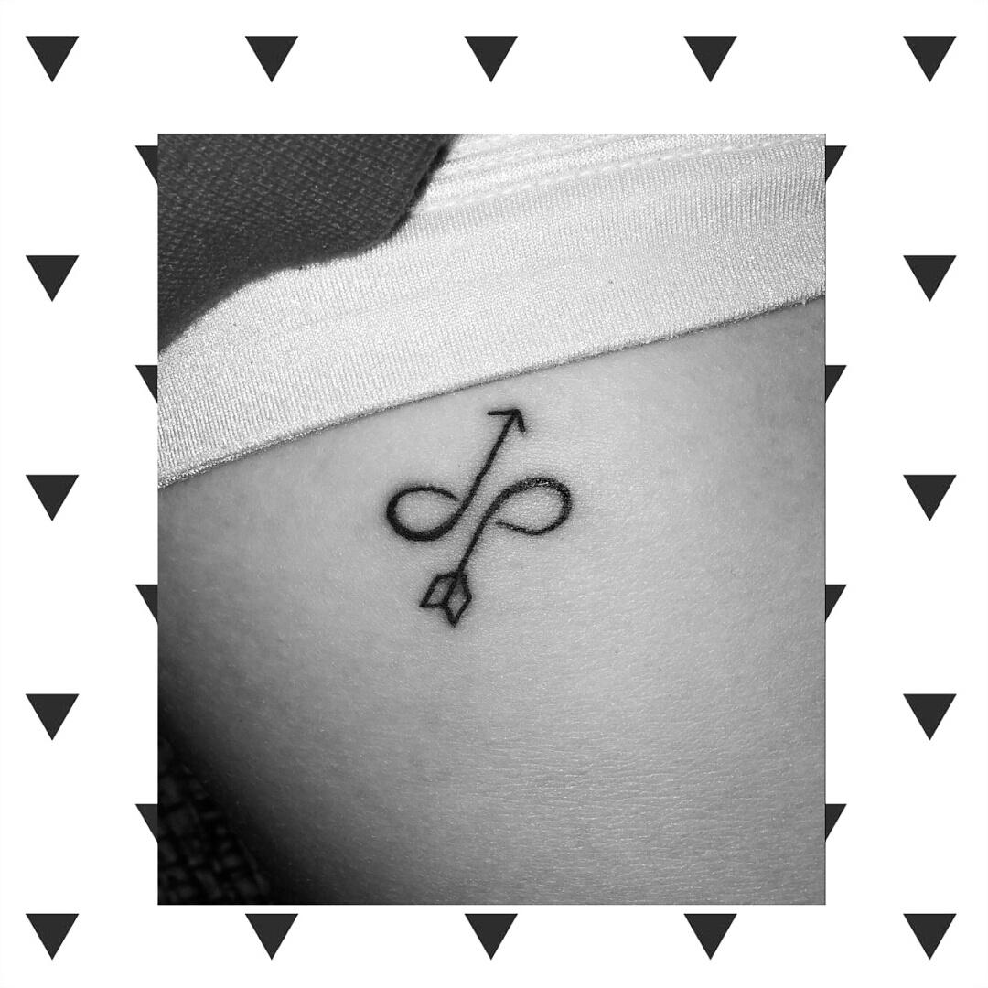 AshleyD2014's tweet photo. To some people tattoos are frown upon and to others their part of their personality... #infinityarrow #tattoos #ink✒ http://t.co/dO0VHou6Kc