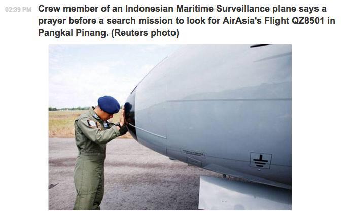 Indonesian Maritime Surveillance plane crew member says a prayer before a search mission for #QZ8501. Pic via <a href="/motulz/">motulz</a>