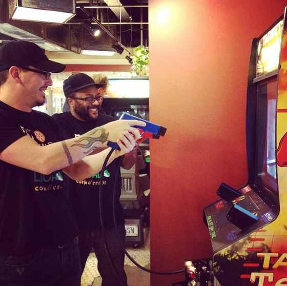 Phil and Eric taking one another for the first game ever in our #arcade! #pewpewpew