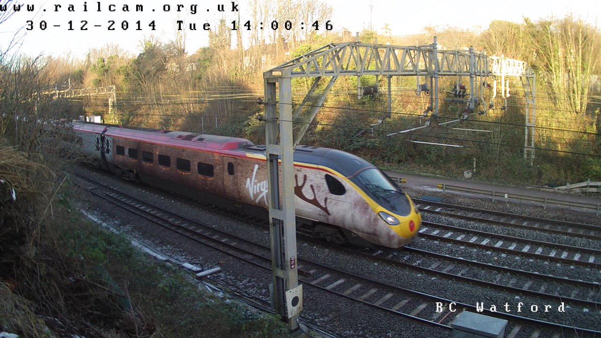 railcamlive's tweet photo. 390112 'Virgin Star' #Traindeer passing Watford Cam. @VirginTrains @TeamVirginTrain #watcam #railcamlive http://t.co/1iwm62Poz2