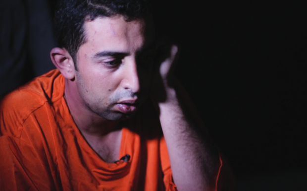 MiddleEastEye's tweet photo. Islamic State magazine features interview with captured Jordanian pilot #JordanPilot http://t.co/kdLOPWSHgP http://t.co/ZEUArwbUmh