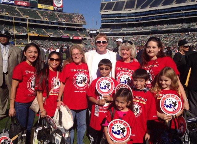 teams4taps's tweet photo. Families from @TAPS4America honoring their loved ones at @RAIDERS #Top10of2014 http://t.co/BQh2ytrhSg
