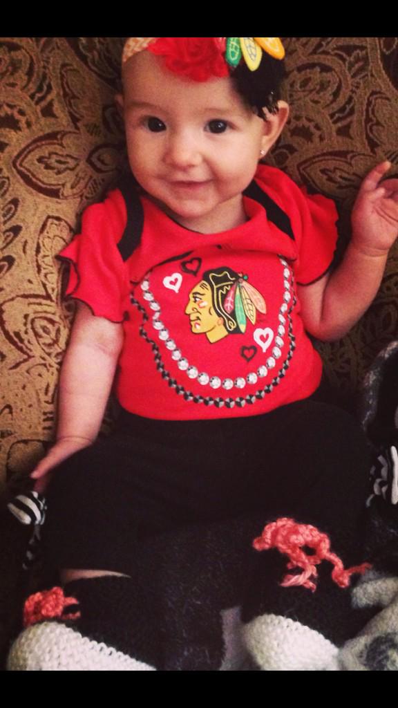 Seids_17's tweet photo. @Buccigross god daughter ready for the hawks to take over #WinterClassic #truehawksfan http://t.co/oeKGCfBmXx